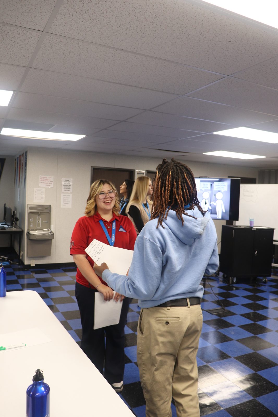 Students practicing networking at Delta Academy